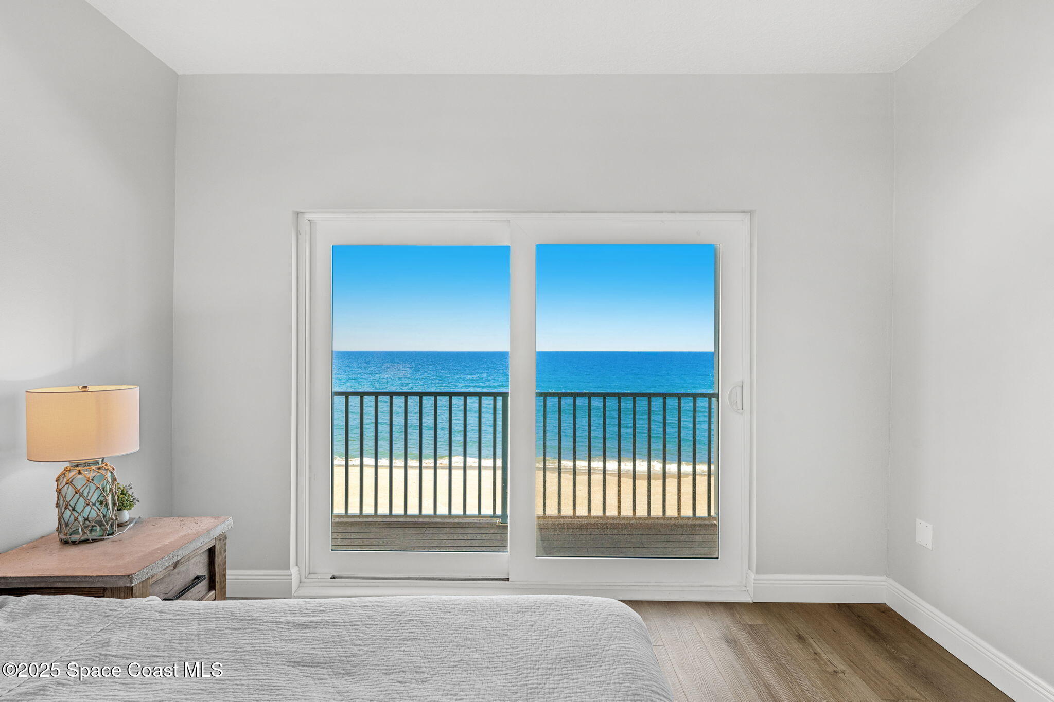3037 S Highway, Unit 3C Melbourne Beach, FL 32951 - Photo 23 of 52 a view of an empty room with a window