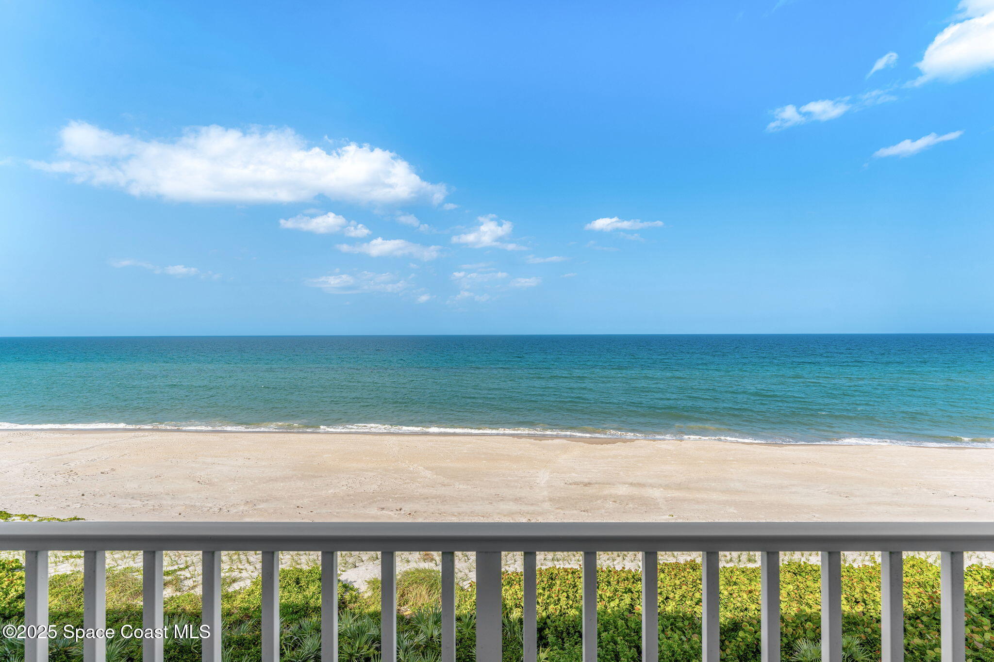 3037 S Highway, Unit 3C Melbourne Beach, FL 32951 - Photo 25 of 52 a view of ocean from a balcony