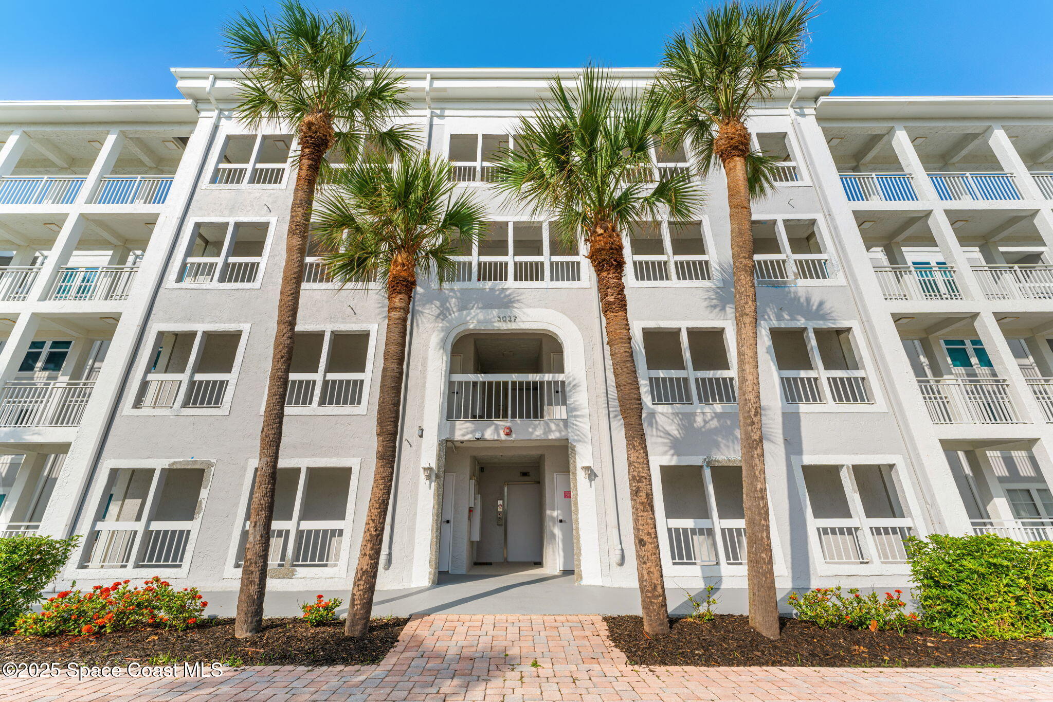 3037 S Highway, Unit 3C Melbourne Beach, FL 32951 - Photo 3 of 52 a front view of a multi story building