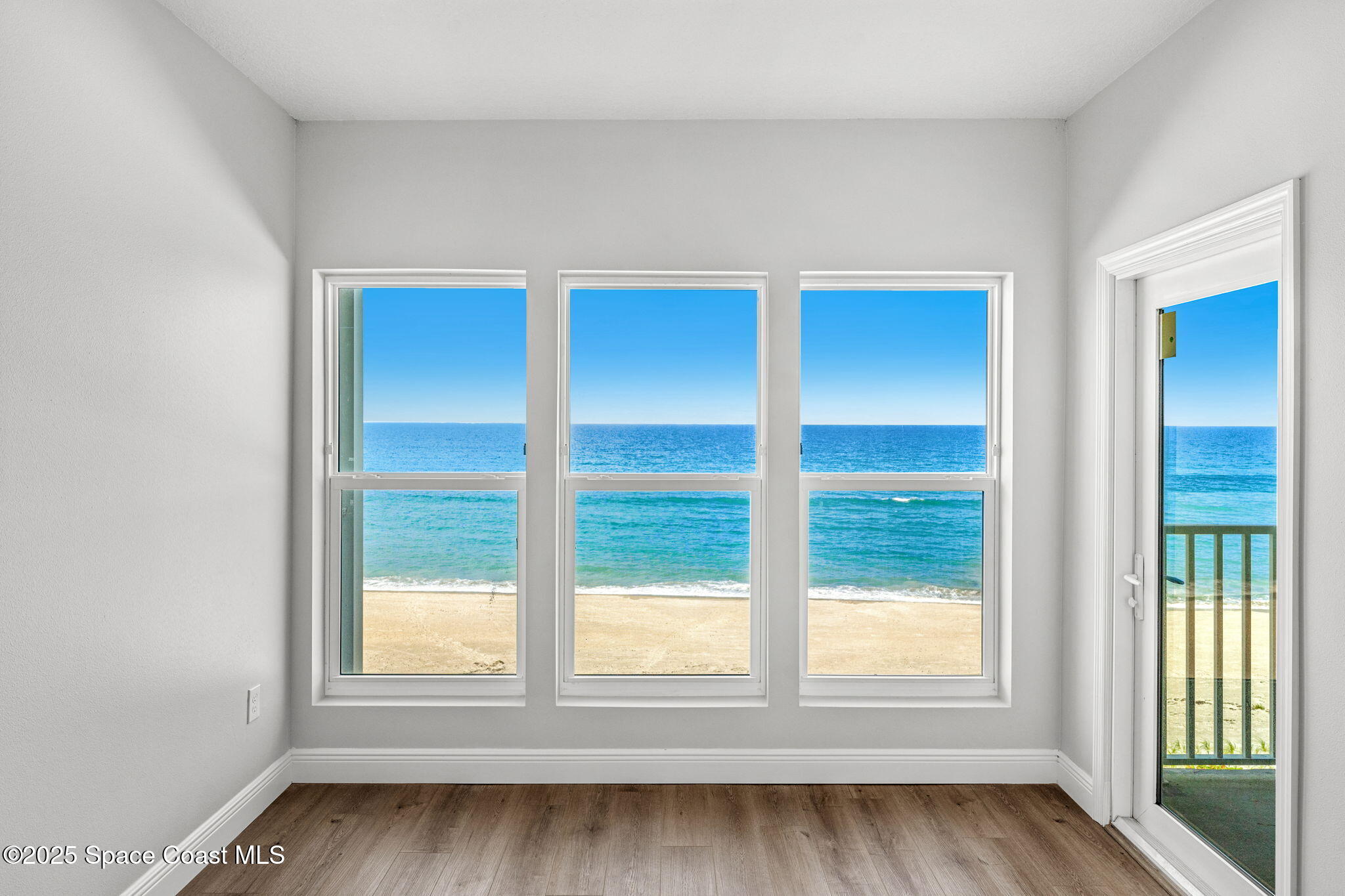 3037 S Highway, Unit 3C Melbourne Beach, FL 32951 - Photo 33 of 52 an empty room with a window