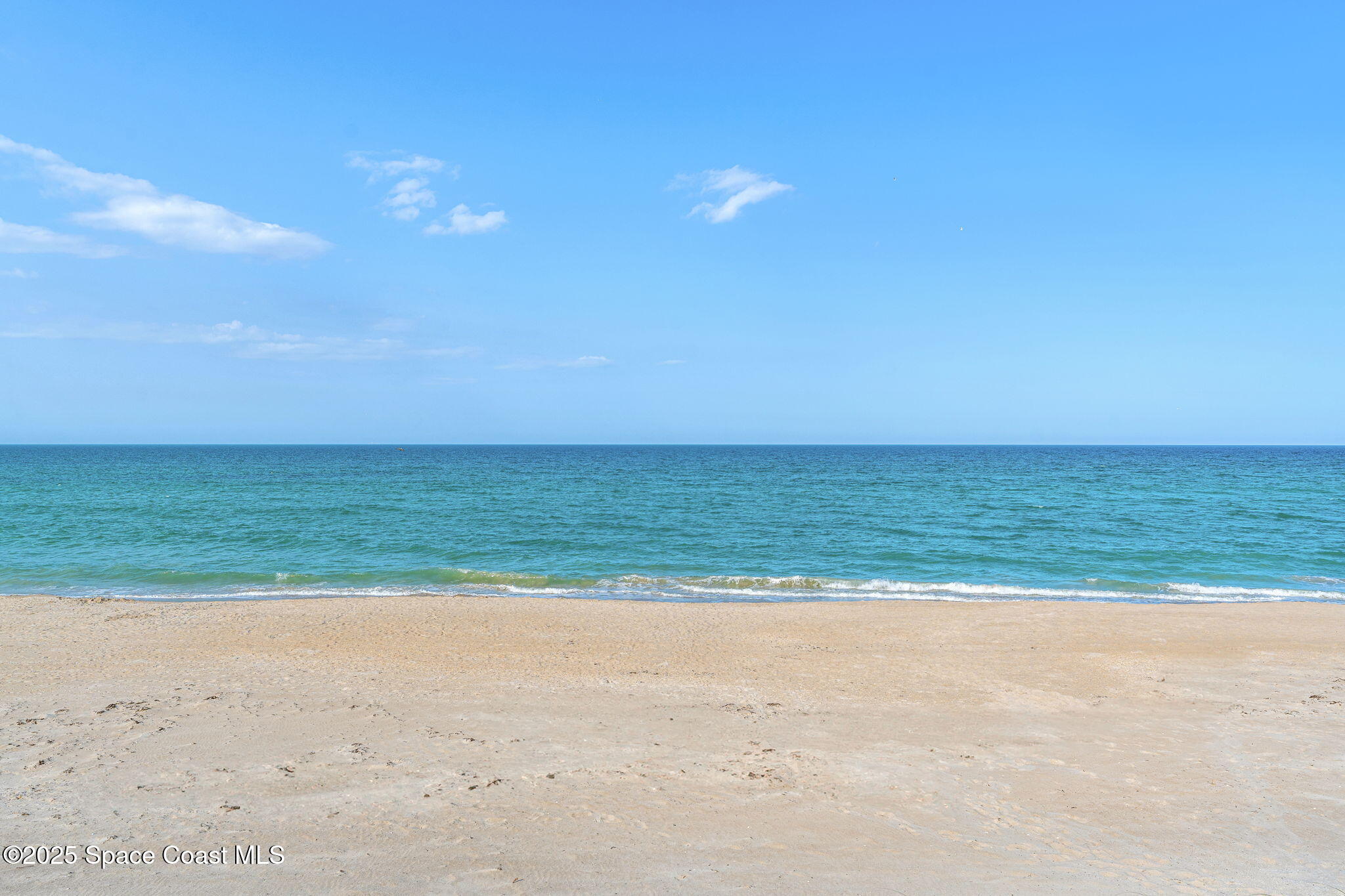3037 S Highway, Unit 3C Melbourne Beach, FL 32951 - Photo 42 of 52 a view of an ocean and beach