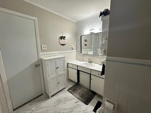 a white toilet sitting next to a shower curtain