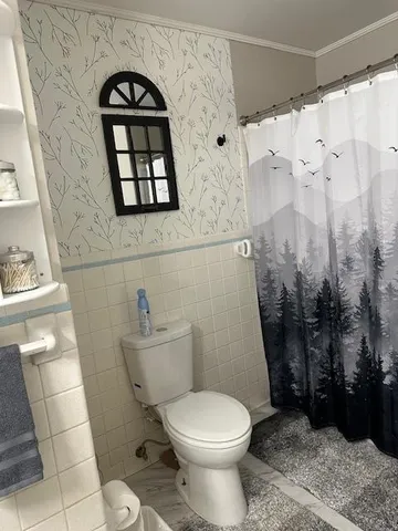 a view of a workspace with furniture