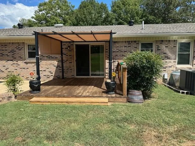 a backyard of a house with lots of green space