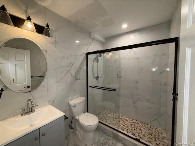 1 South Hamilton Street, Unit 3 Poughkeepsie, NY 12601 - Photo 16 of 17 a bathroom with a sink toilet and shower