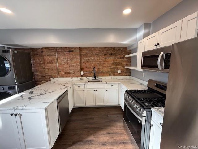 1 South Hamilton Street, Unit 3 Poughkeepsie, NY 12601 - Photo 3 of 17 a kitchen with a sink stove top oven and cabinets