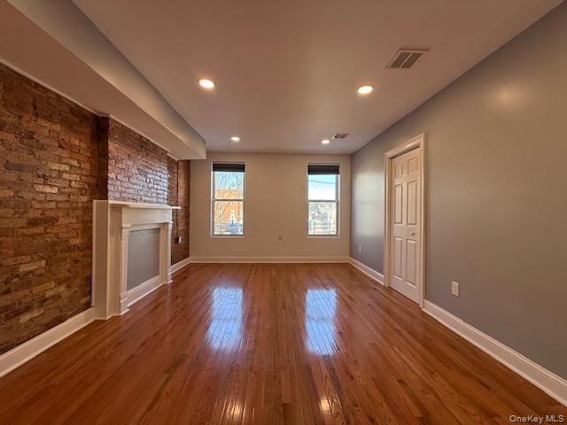 1 South Hamilton Street, Unit 3 Poughkeepsie, NY 12601 - Photo 8 of 17 a view of an empty room with wooden floor and a window