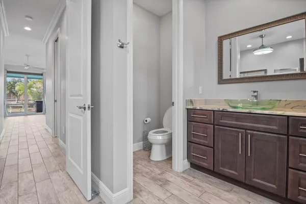 a view of a lake with couches and city view