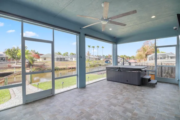a view of a chairs and table on the wooden floor