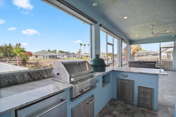 an aerial view of a house with swimming pool
