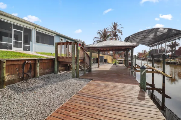 an aerial view of a house with a lake view