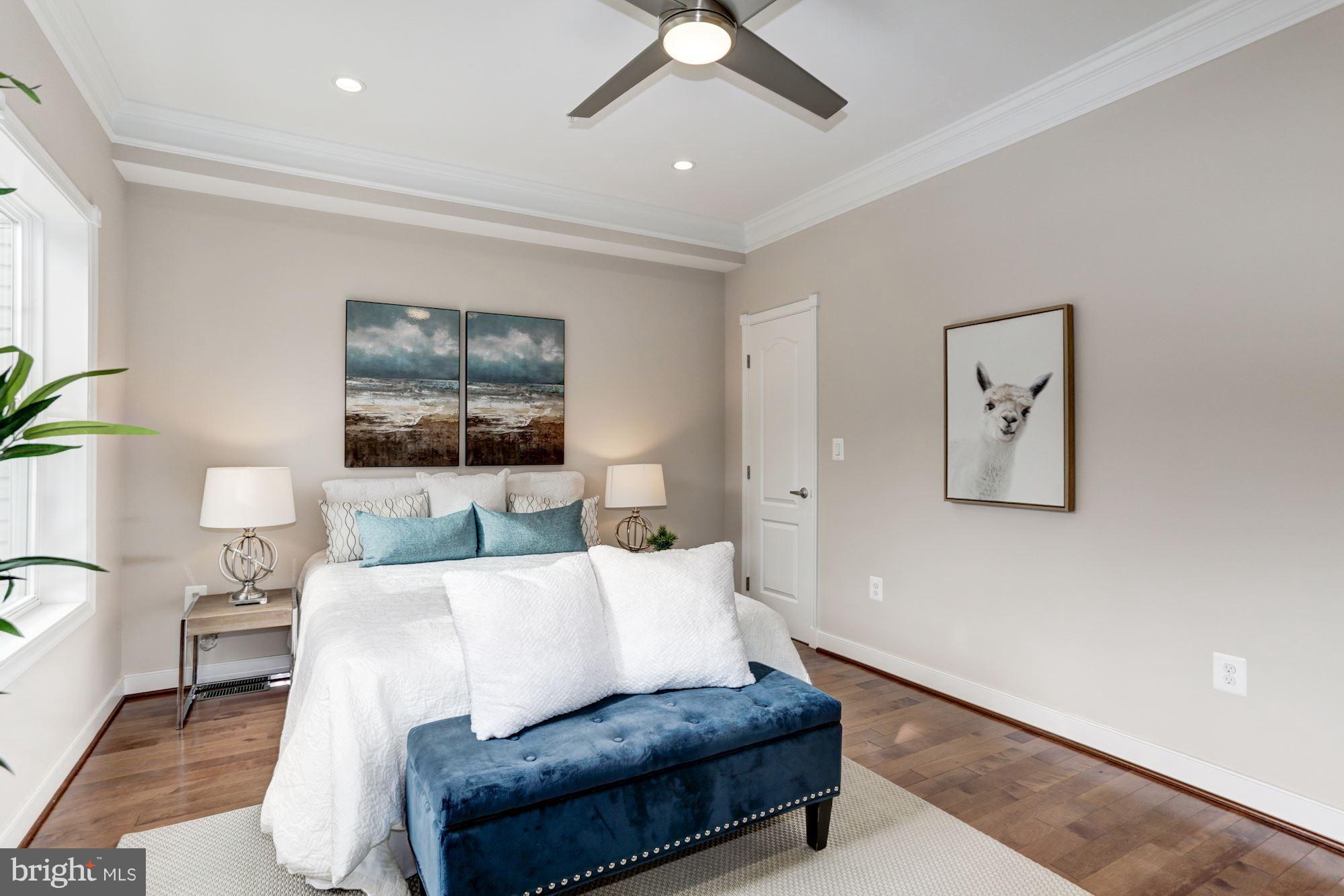 59 R Street Northeast, Unit 1 Washington, DC 20002 - Photo 18 of 40 a living room with furniture and a painting on the wall