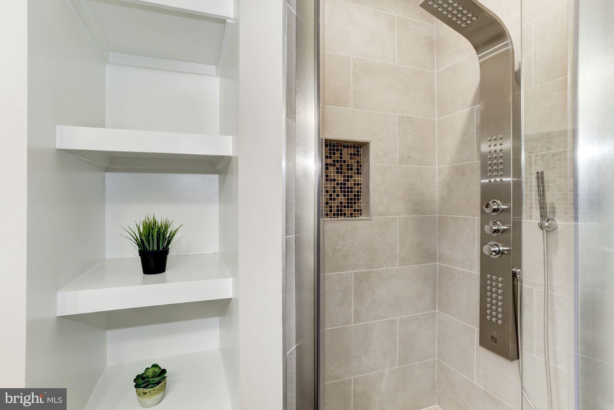 59 R Street Northeast, Unit 1 Washington, DC 20002 - Photo 23 of 40 a view of bathroom with shower