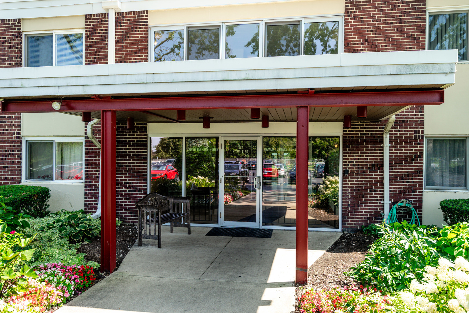 127 North Wolf Road, Unit 59A Wheeling, IL 60090 - Photo 1 of 17 front view of a building