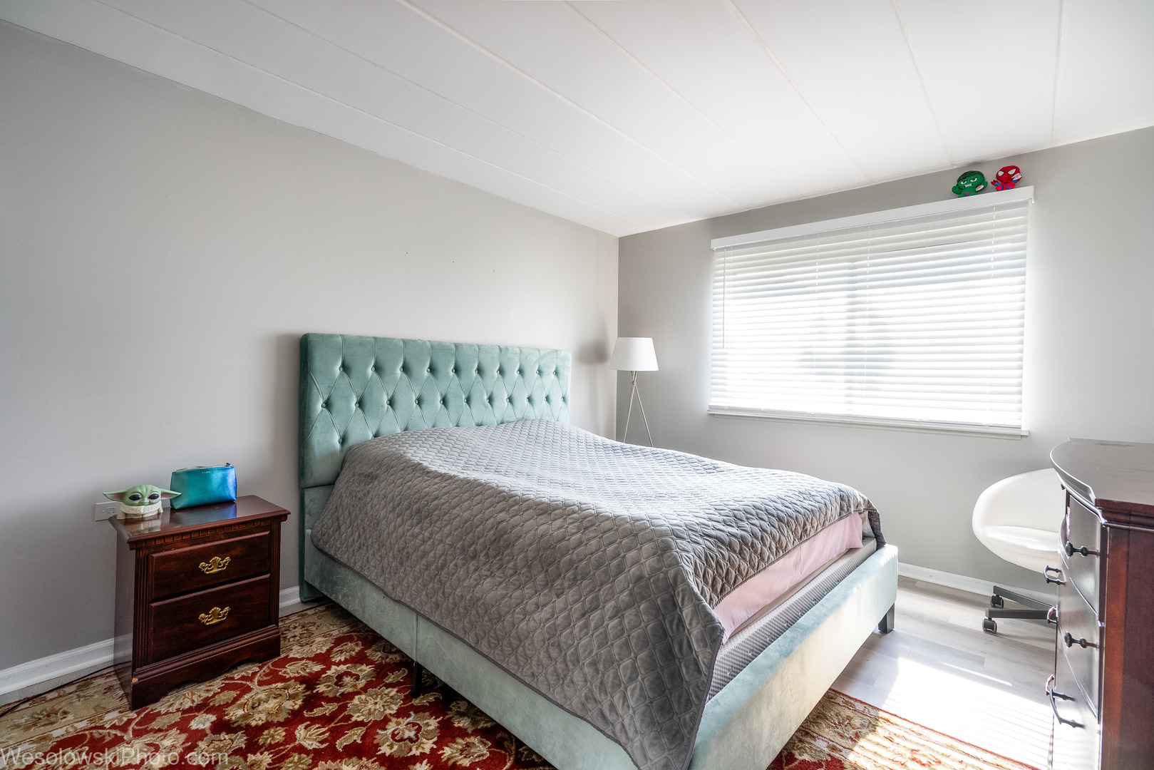 127 North Wolf Road, Unit 59A Wheeling, IL 60090 - Photo 5 of 17 a bedroom with a bed and a window