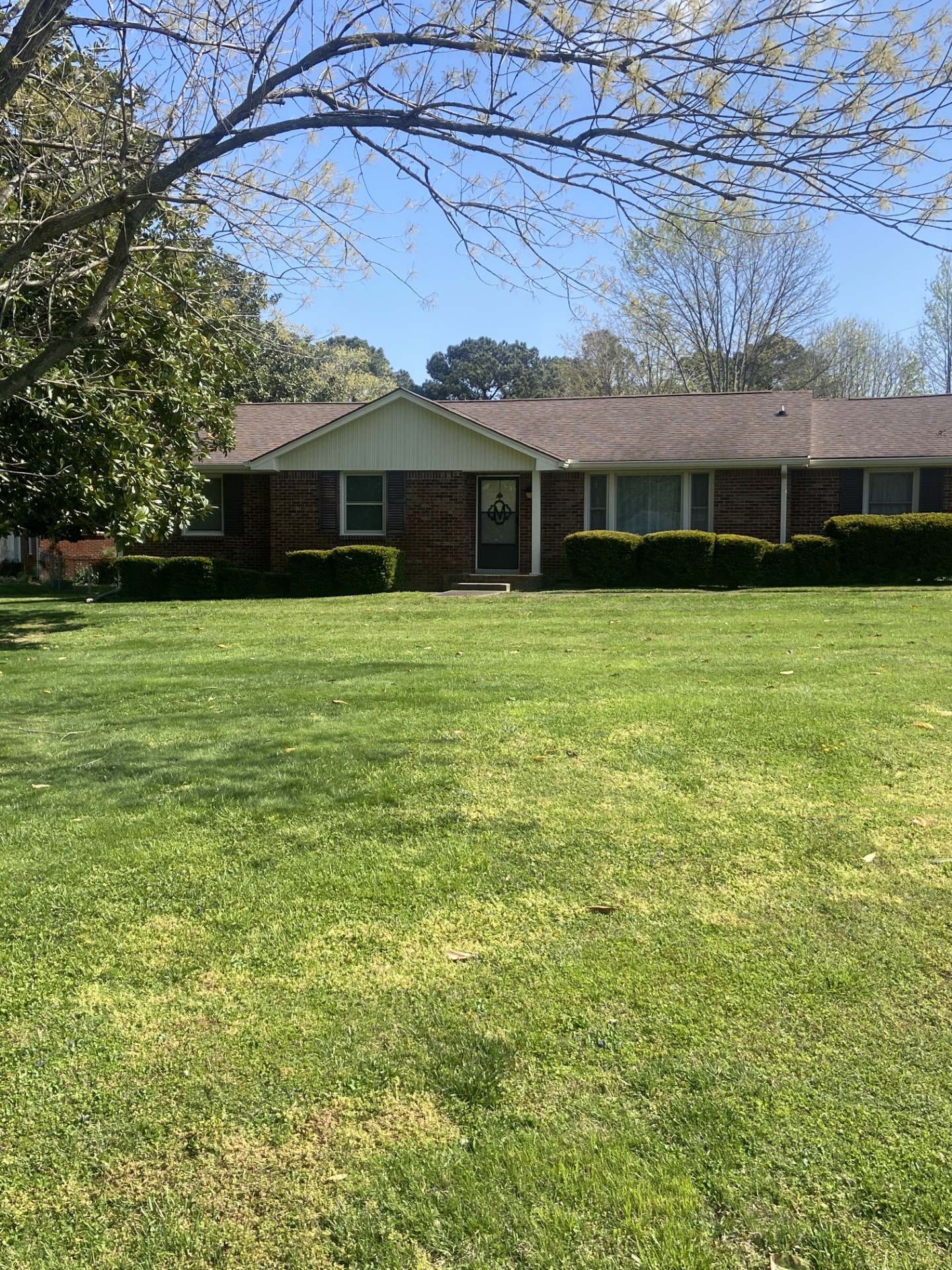2169 Post Road Clarksville, TN 37043 - Photo 1 of 14 a front view of a house with a garden