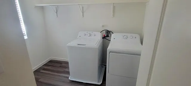 a utility room with dryer and washer