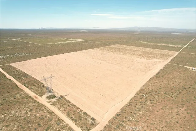 a close up of a white and white bed