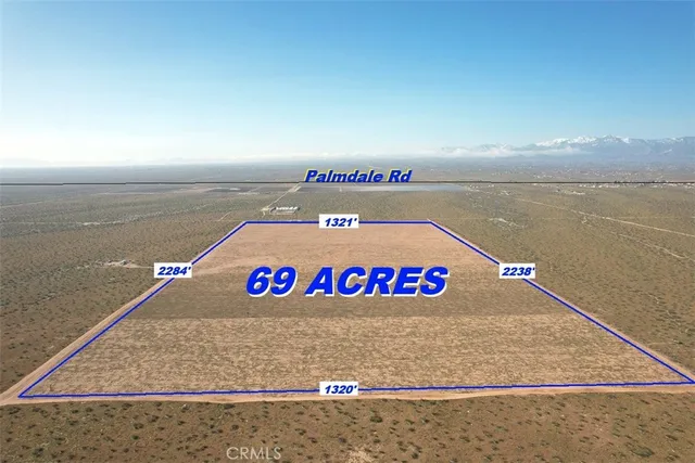 a view of a street with an ocean view