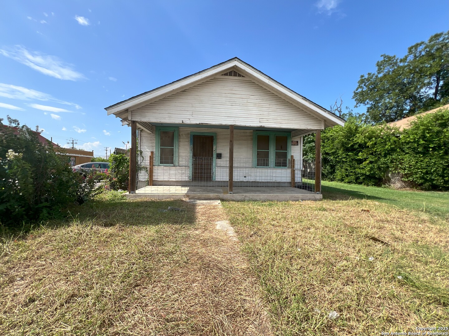 1143 Culebra Road San Antonio, TX 78201 - Photo 1 of 6 a front view of a house with garden