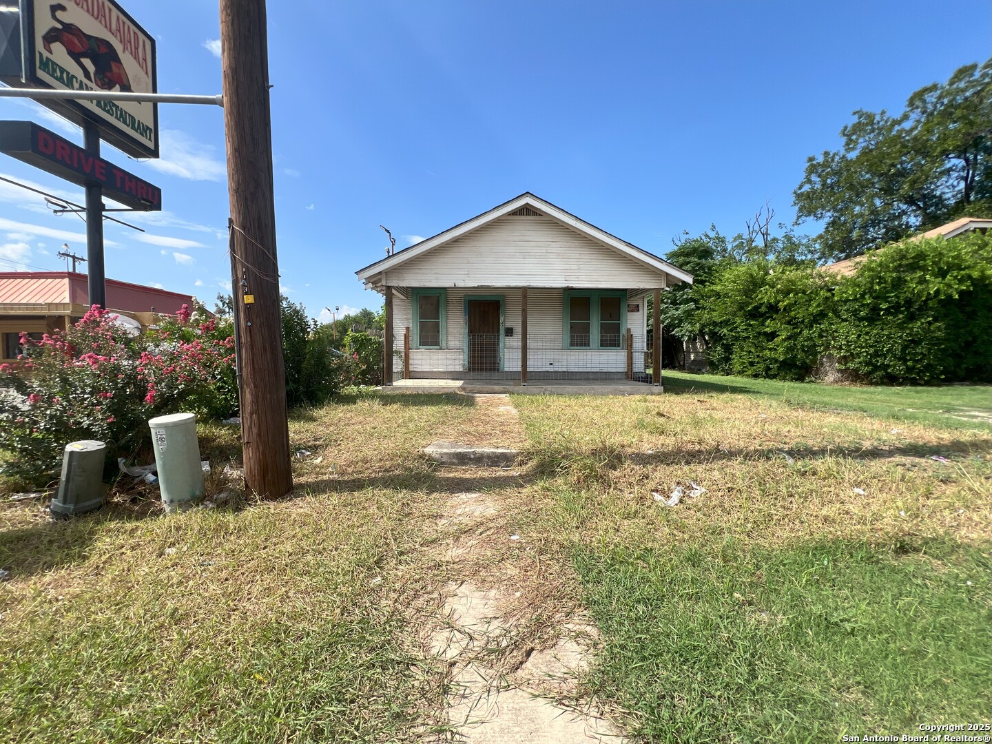 1143 Culebra Road San Antonio, TX 78201 - Photo 2 of 6 a view of a house with backyard and sitting area