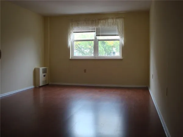 a kitchen with a sink stove and refrigerator