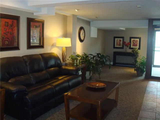 a view of a workspace with furniture