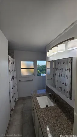a bathroom with a granite countertop sink a mirror and shower