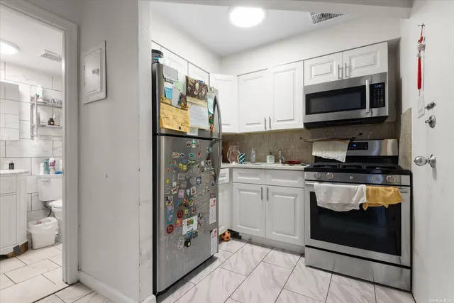 $1,888,888 | 86-18 57th Road | Elmhurst