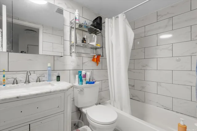 $1,888,888 | 86-18 57th Road | Elmhurst