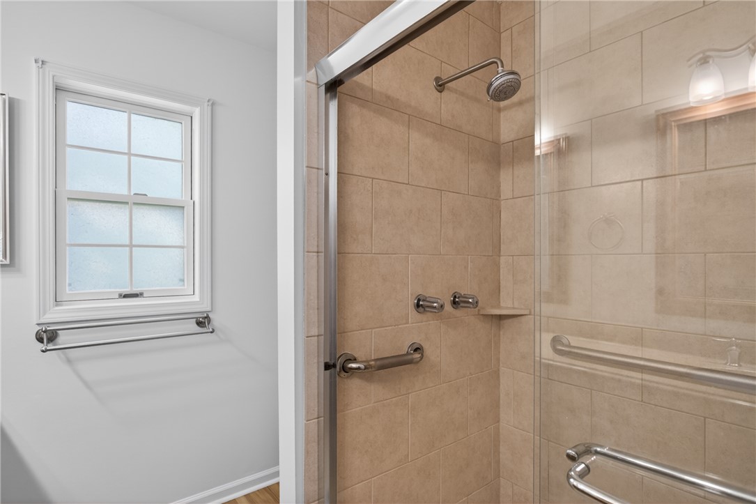 9 Lookout Lane Salem, SC 29676 - Photo 19 of 46 A well-lit shower features contemporary tile work and a convenient window.