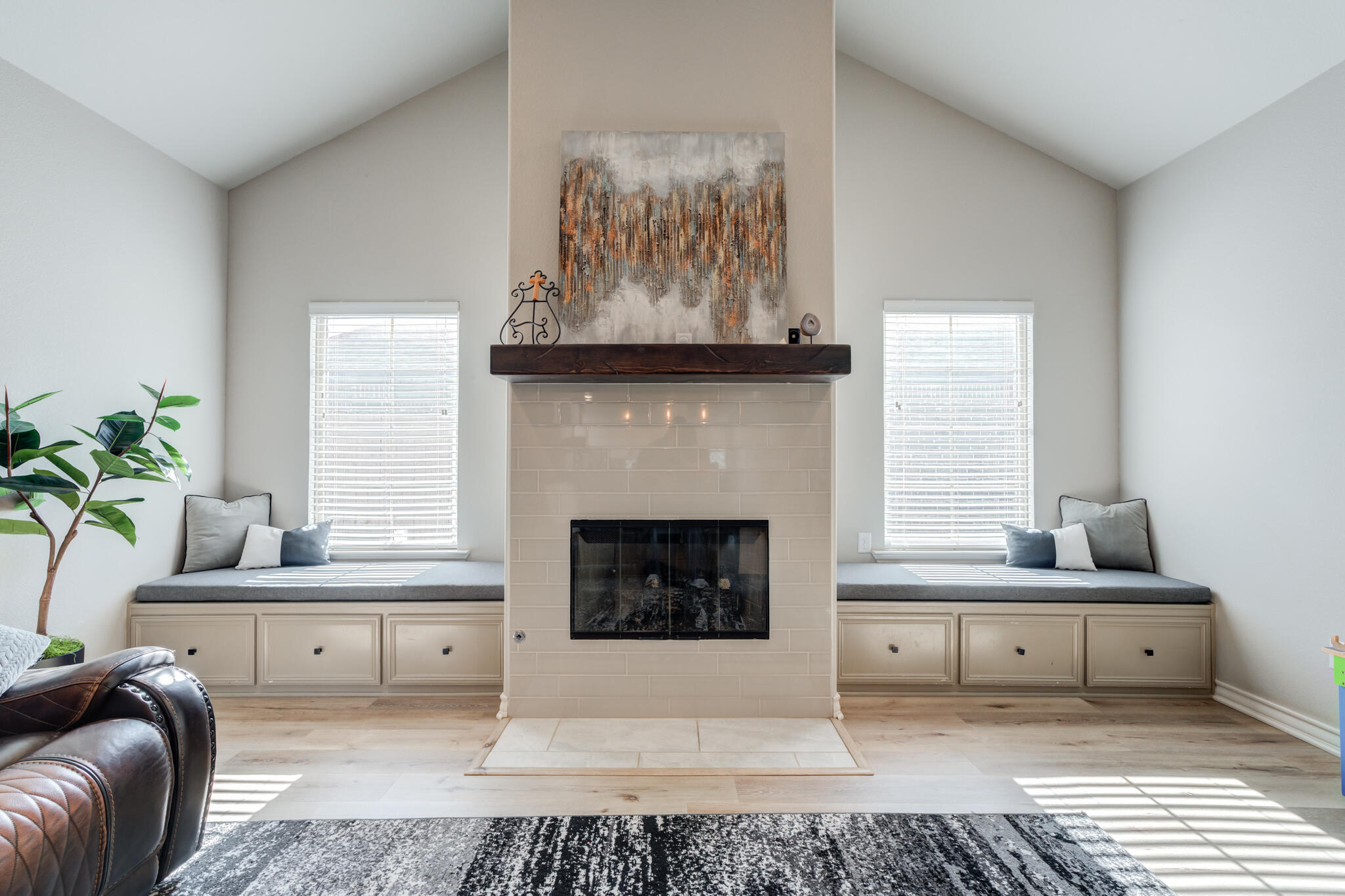 9609 Inverness Avenue Lubbock, TX 79424 - Photo 2 of 17 a living room with furniture and a fireplace