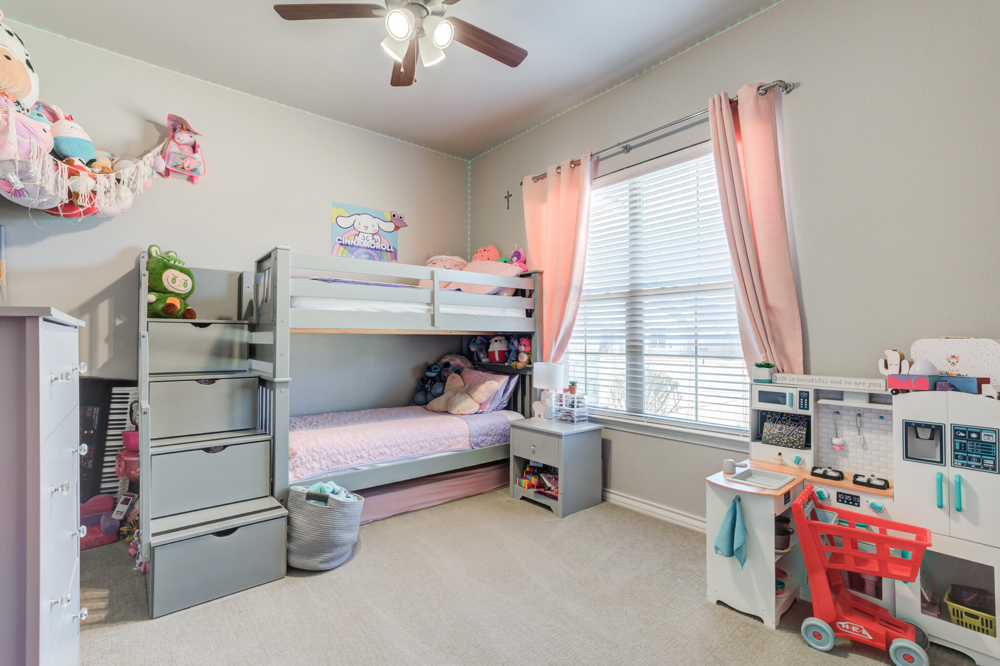 9609 Inverness Avenue Lubbock, TX 79424 - Photo 10 of 17 a bedroom with a bed and a window