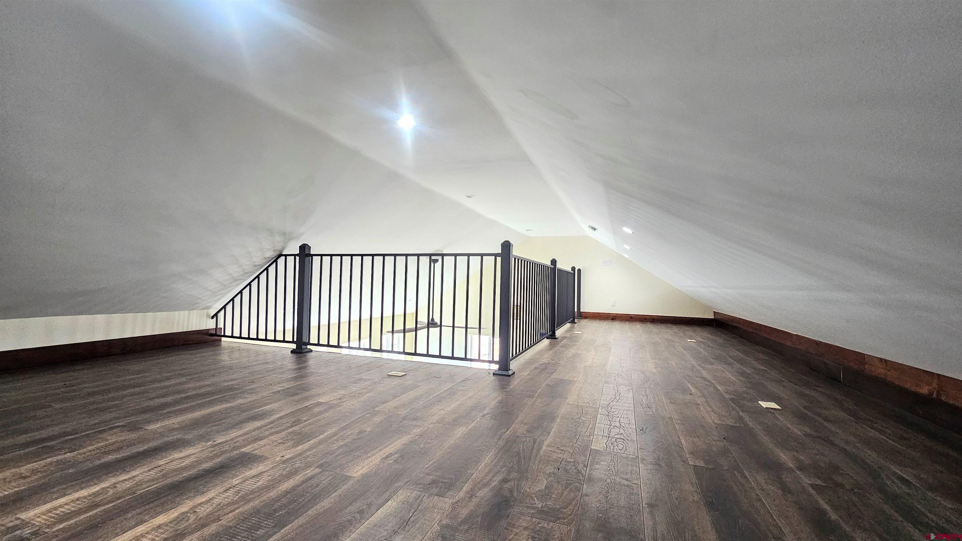 10547 Palm Road Blanca, CO 81123 - Photo 8 of 32 a view of a room with wooden floor