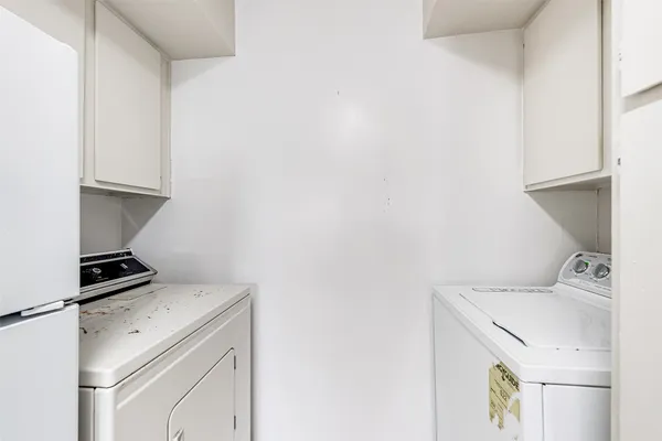 a bathroom with a double vanity sink and mirror