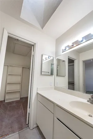 a view of a house with swimming pool and a yard