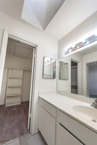 a view of a house with swimming pool and a yard