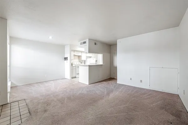 a view of a kitchen with a sink
