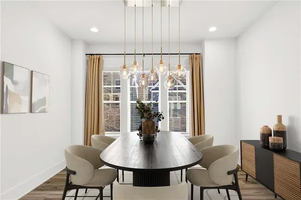 a view of entryway with wooden floor