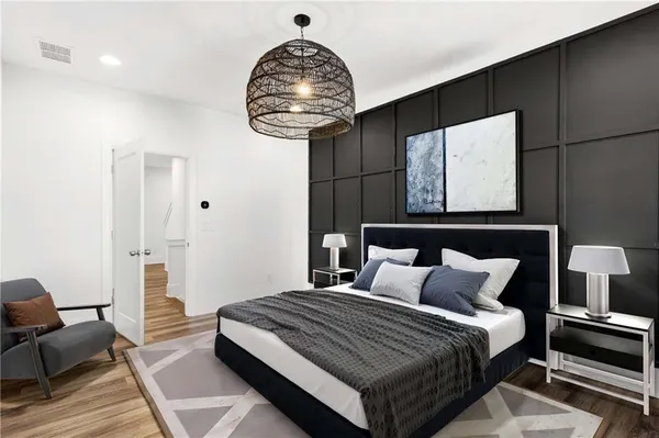 a view of a livingroom with wooden floor