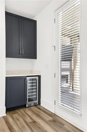 a bathroom with a sink vanity granite toilet and shower