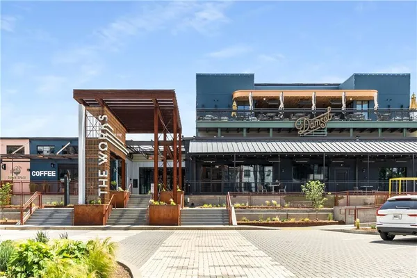 a front view of a building with street view