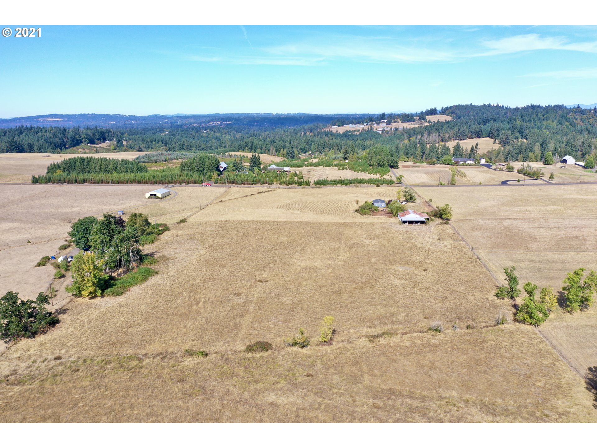 12530 South Union Hall Road Canby, OR 97013 - Photo 4 of 26 a view of a lake with beach and city view
