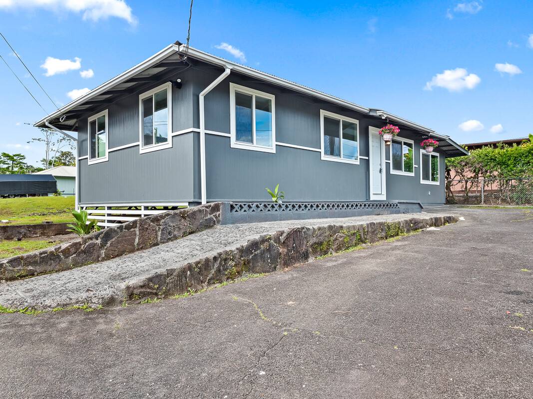 1907 Uhaloa Road Hilo, HI 96720 - Photo 15 of 23 a front view of a house with a road