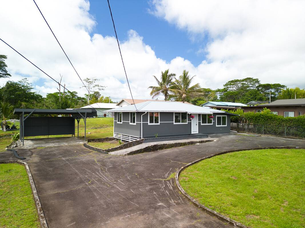 1907 Uhaloa Road Hilo, HI 96720 - Photo 16 of 23 a view of a swimming pool with a patio