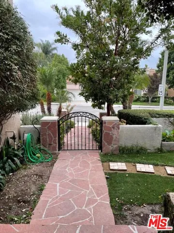 a outdoor space with patio the couches and a umbrella