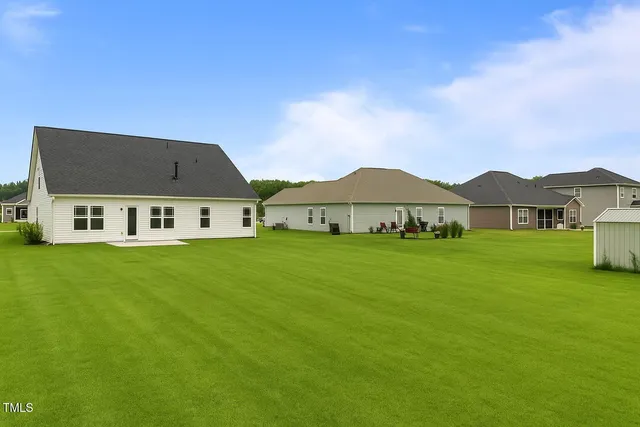 a view of house with garden