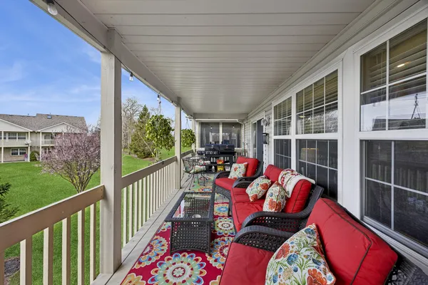 a view of a balcony with couch