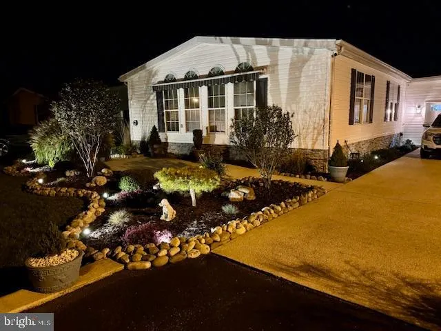 a view of a house with swimming pool