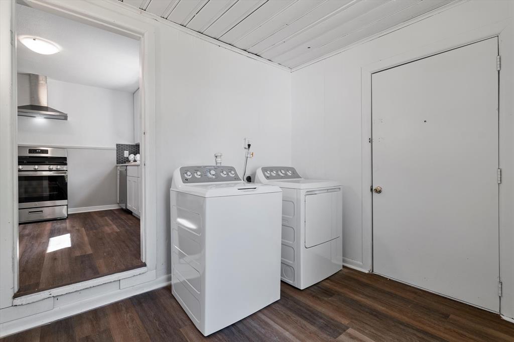 2411 Denison Street Denton, TX 76201 - Photo 12 of 15 a utility room with cabinets washer and dryer